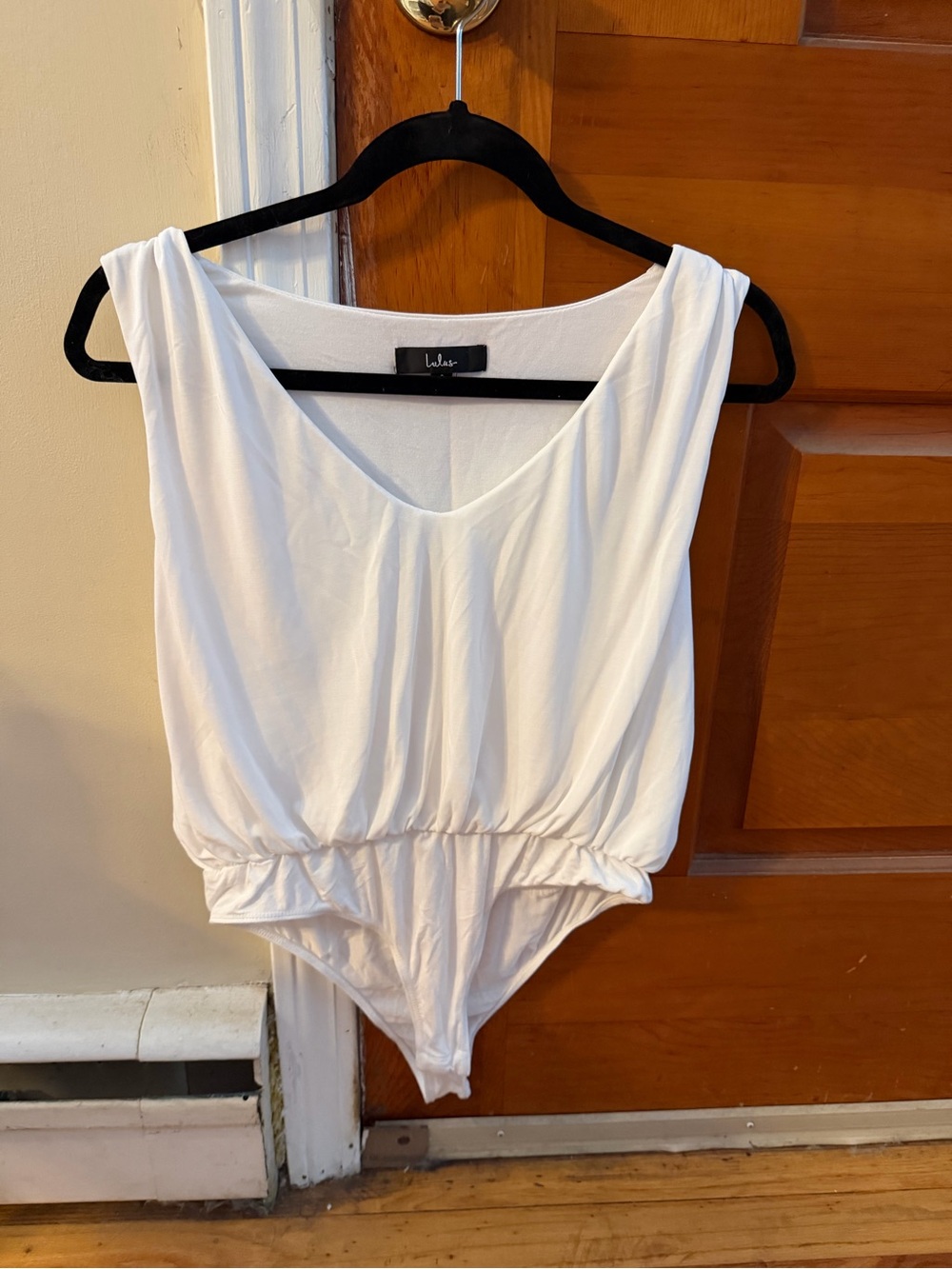 Lulu's White V-Neck Gathered Waist Sleeveless Bodysuit